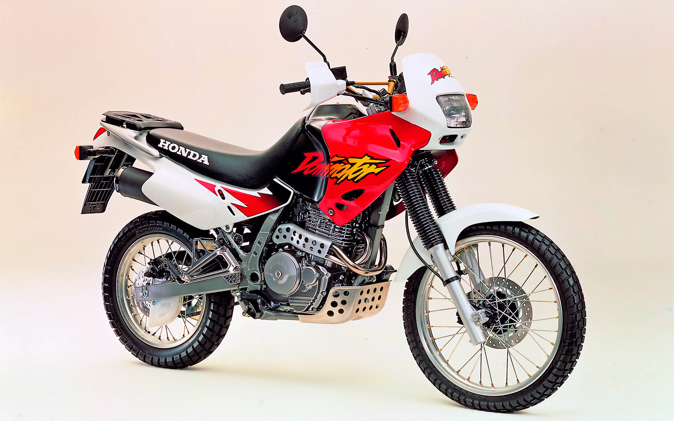 Мотоцикл Honda NX 650 Dominator 1996 Цена, Фото, Характеристики, Обзор,  Сравнение на БАЗАМОТО